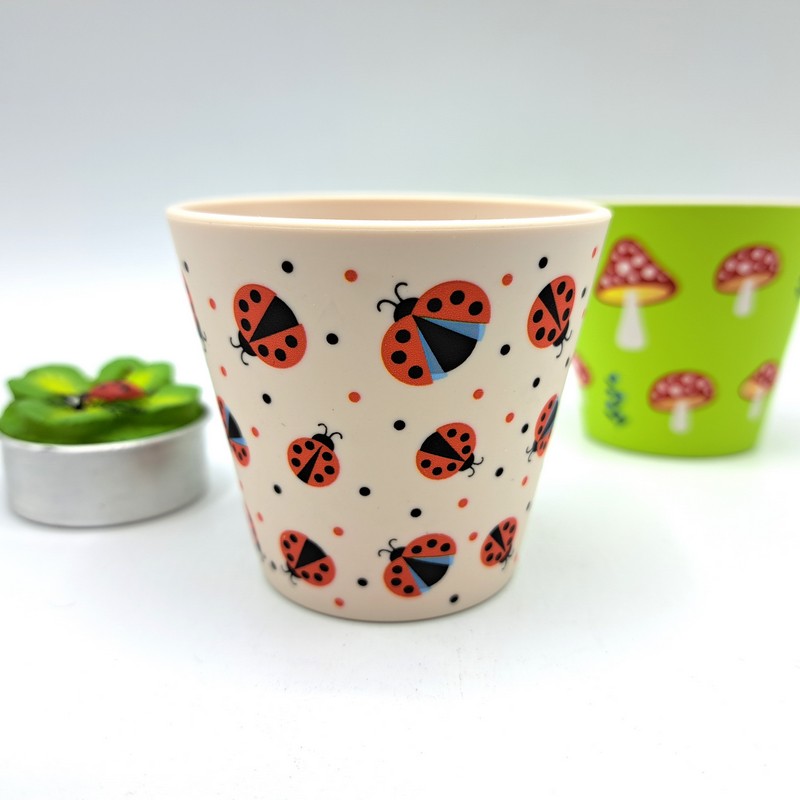 Tazzina bianca da caffè espresso in materiale riciclato decorata con coccinelle
