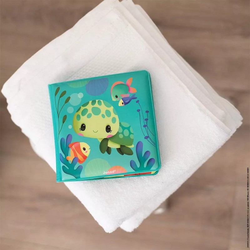 Libro magico da bagno che cambia a contatto con l'acqua con illustrazioni che mostrano la vita delle tartarughe