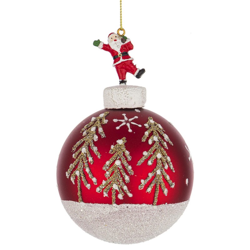 Pallina di Natale rossa decorata con alberi e Babbo Natale