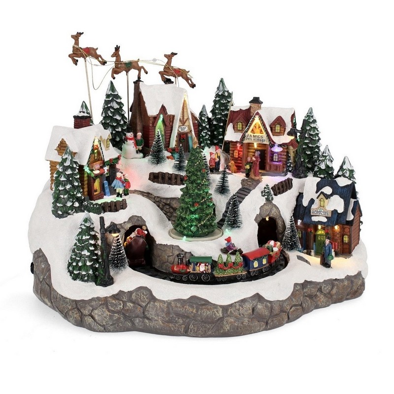Villaggio natalizio con musica, movimento e luci LED a tema paese montano con Babbo Natale, renne, albero di Natale e treno