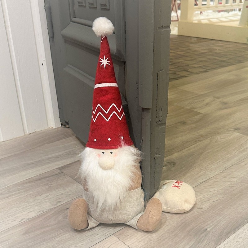 Fermaporta morbido a forma di Babbo Natale con sacco con scritta “X-Mas”