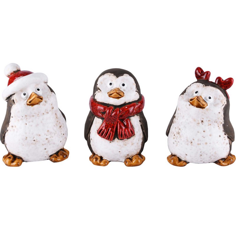 Pinguino natalizio decorativo in ceramica da appoggio con cappello di Babbo Natale