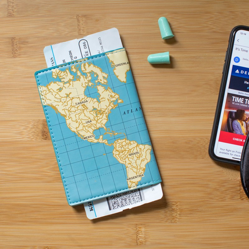 Porta passaporto, documenti di viaggio, carte di credito e contante con decoro mappamondo
