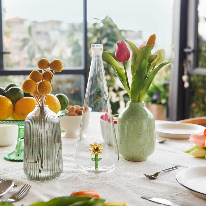 Bottiglia in vetro borosilicato con tappo e decoro interno fatto a mano a forma di girasole