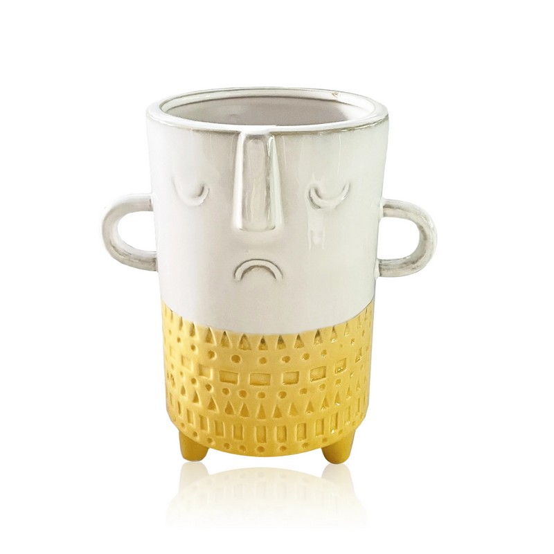 Vaso bianco e giallo con faccia triste in ceramica