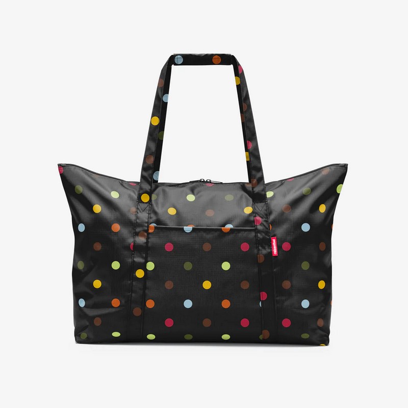 Borsa da viaggio pieghevole nera a pois multicolor, un accessorio ideale da inserire in valigia