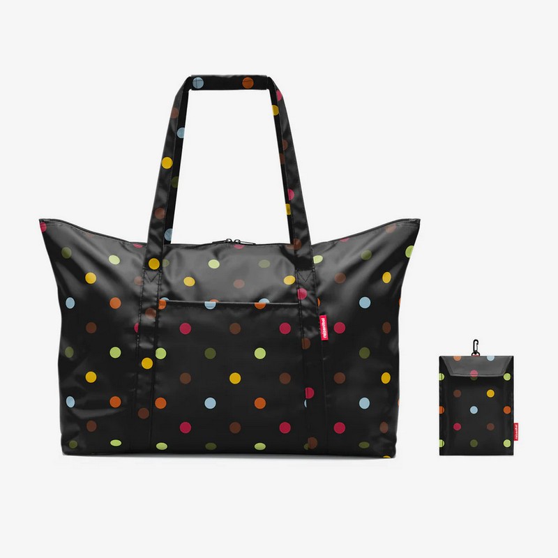 Borsa da viaggio pieghevole nera a pois multicolor, un accessorio ideale da inserire in valigia