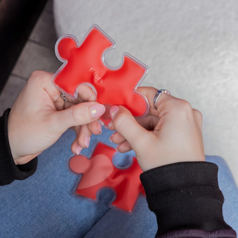Set 2 scaldamani riutilizzabili a forma di pezzi di puzzle