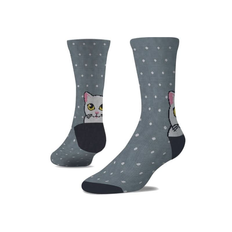 Paio di calze grigie a pois decorate con gatto bianco