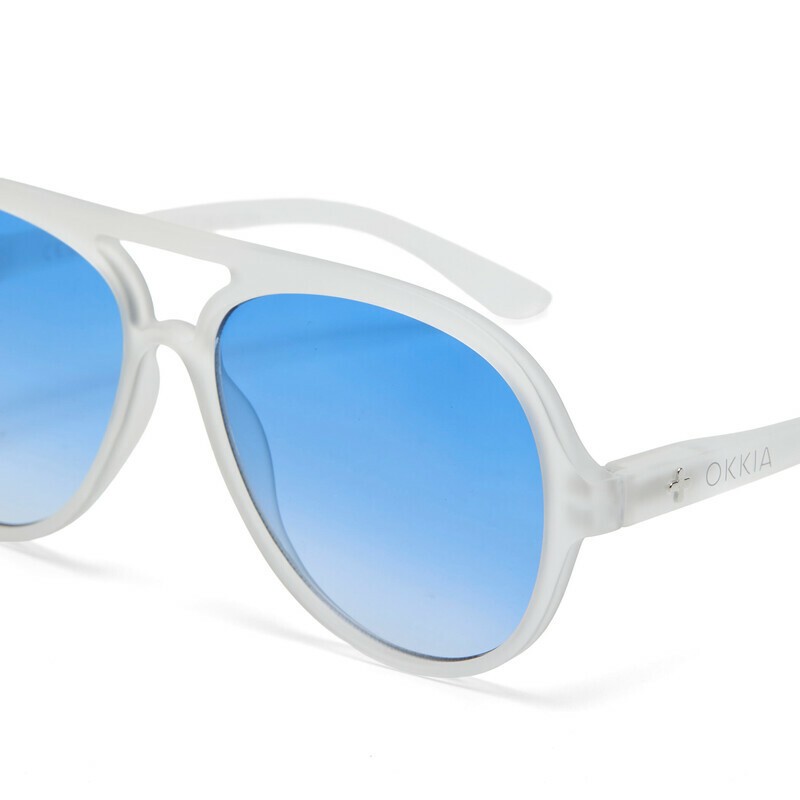 Occhiale da sole a goccia traslucido con lenti blu gradiente