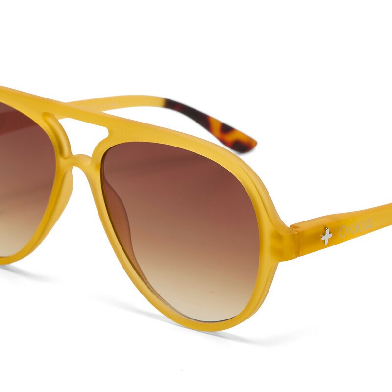 Occhiale da sole a goccia giallo con lenti marrone gradiente