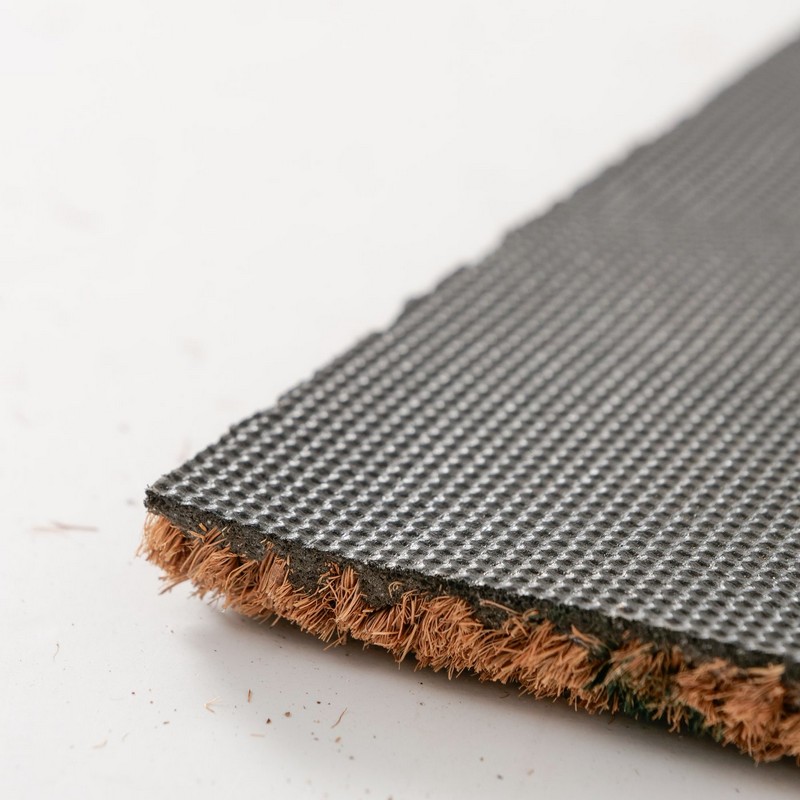 Zerbino con campo di fiori realizzato in fibra di cocco con fondo antiscivolo