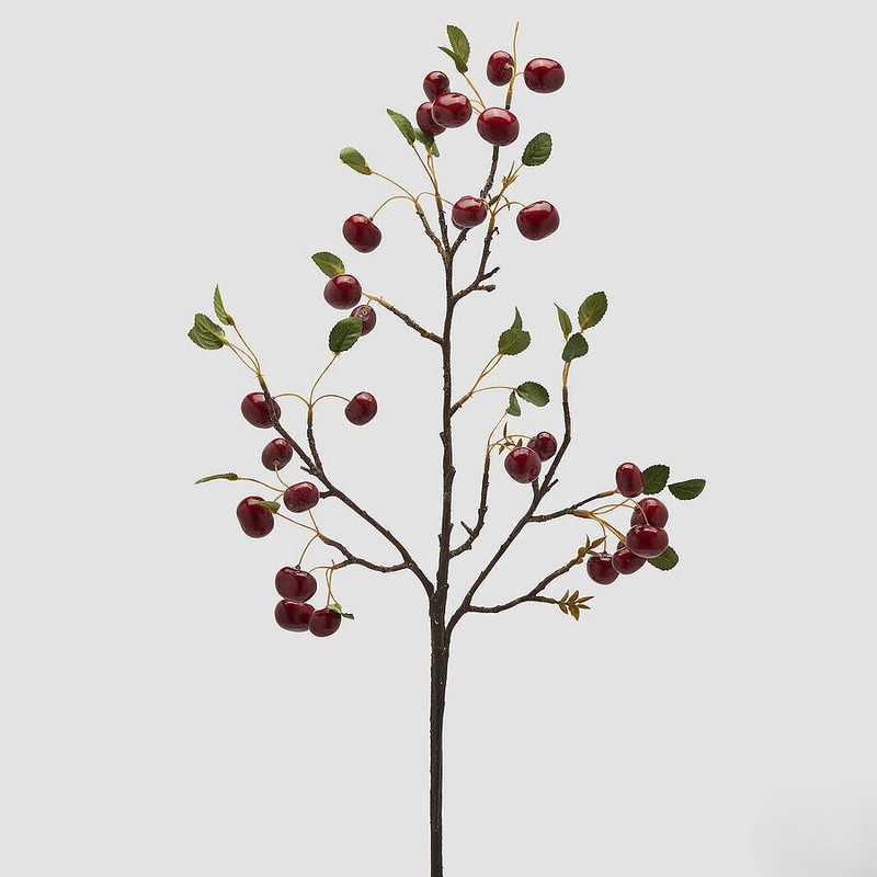 Ramo artificiale di ciliegie con foglie