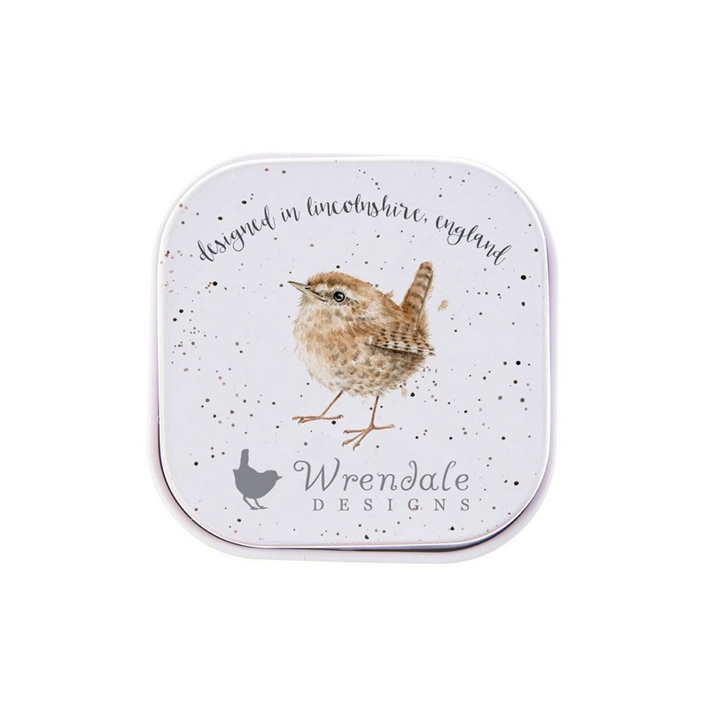 Balsamo per labbra al profumo di miele e vaniglia contenuto in scatola di latta decorata con uccellino su vaso