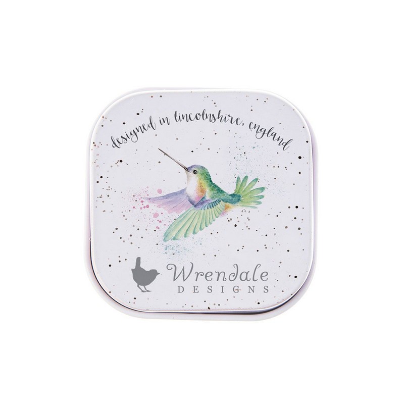 Balsamo per labbra al profumo di miele e vaniglia contenuto in scatola di latta decorata con colibrì