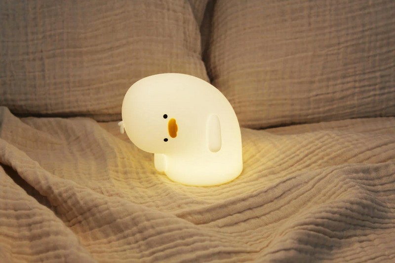 Luce notturna morbida in silicone a forma di anatra con testa ciondolante con controllo touch e luce calda, funzione timer e batteria interna ricaricabile
