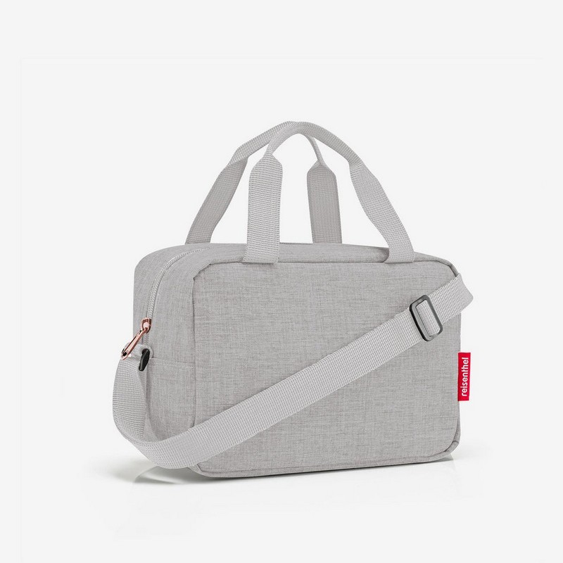 Borsa termica grigia mélange con cerniere in metallo rosé da 3 litri di capacità con chiusura zip, manico e tasca interna, ideale per mantenere la temperatura di cibo, farmaci e cosmetici