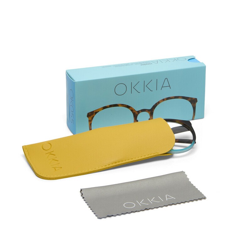 Occhiale da lettura con montatura tonda di colore havana blu, lenti da lettura +1.50 diottrie, include astuccio e panno in microfibra