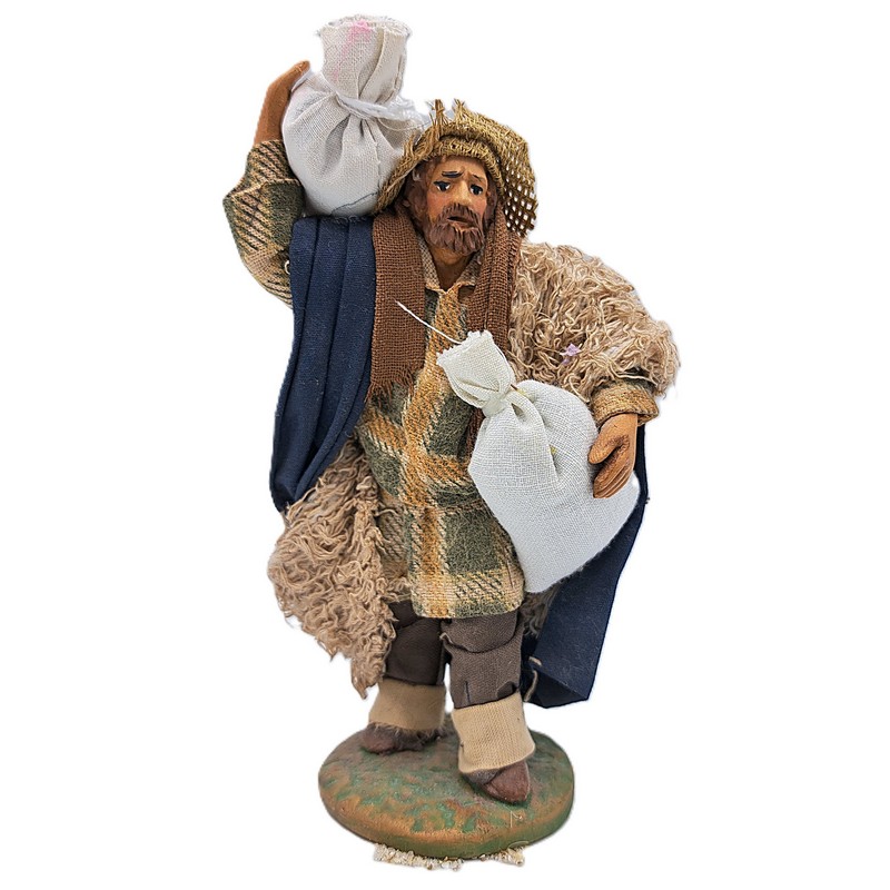 Uomo barbuto con sacchi di farina del presepe napoletano, prodotto artigianale di Napoli fatto a mano e dipinto a mano