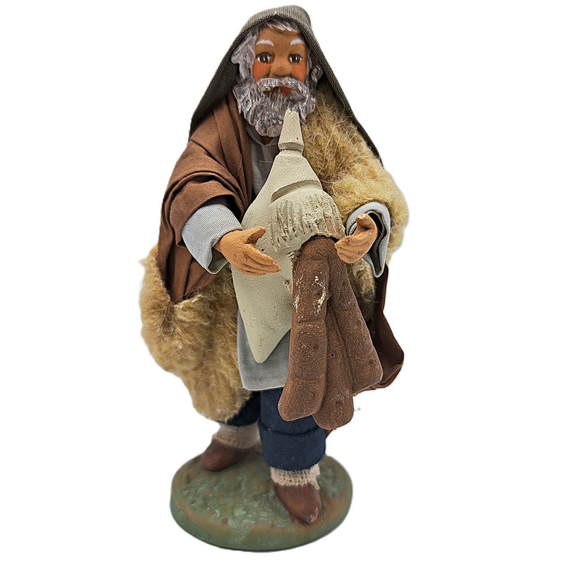 Zampognaro anziano del presepe napoletano, composta da due statuette separate, prodotto artigianale di Napoli fatto a mano e dipinto a mano