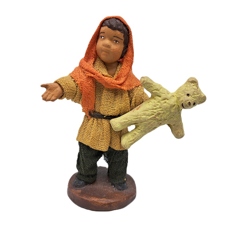 Bambino con orsetto del presepe napoletano, prodotto artigianale della città metropolitana di Napoli fatto a mano e dipinto a mano