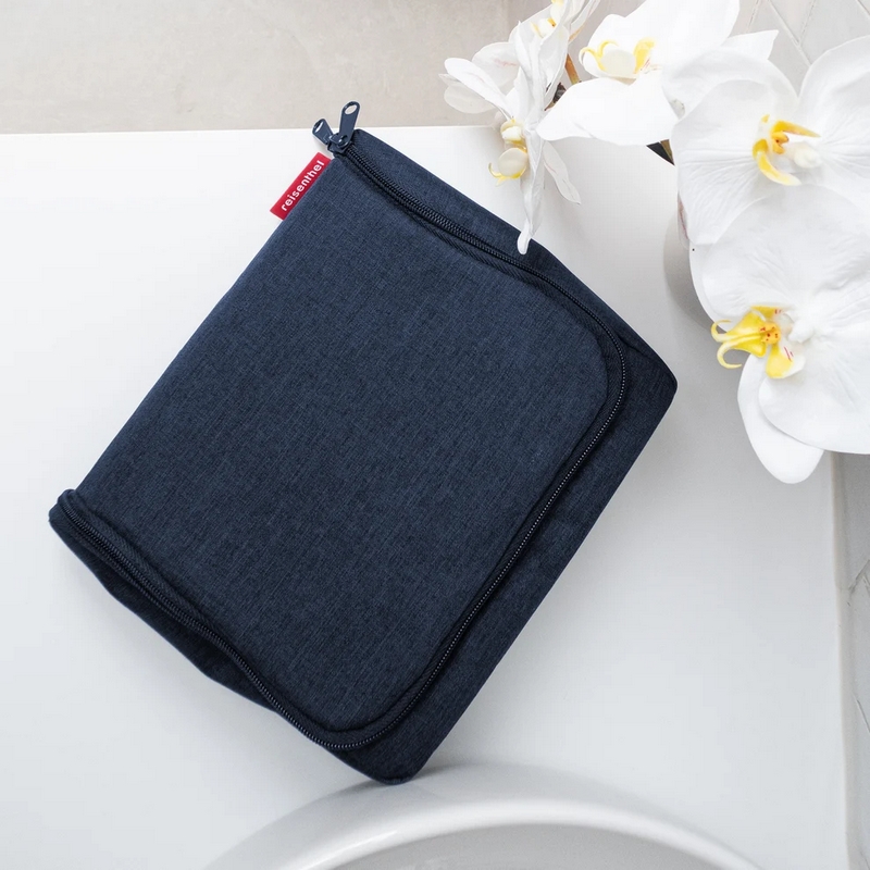 Beauty da viaggio blu scuro tessuto mélange con inserti da aprire, specchio e possibilità di essere appeso - il regalo ideale per viaggiatori!