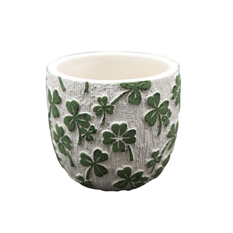 Vaso in cemento a righe verticali decorato con quadrifogli e trifogli