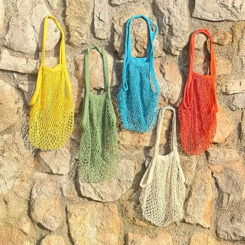 Borsa a rete 100% cotone rosso, perfetta come soluzione ecologica e versatile