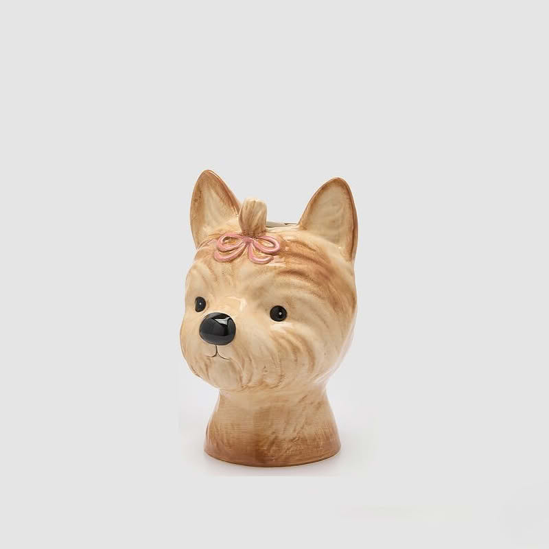 Vaso a forma di yorkshire terrier con ciuffo su cuscino in ceramica