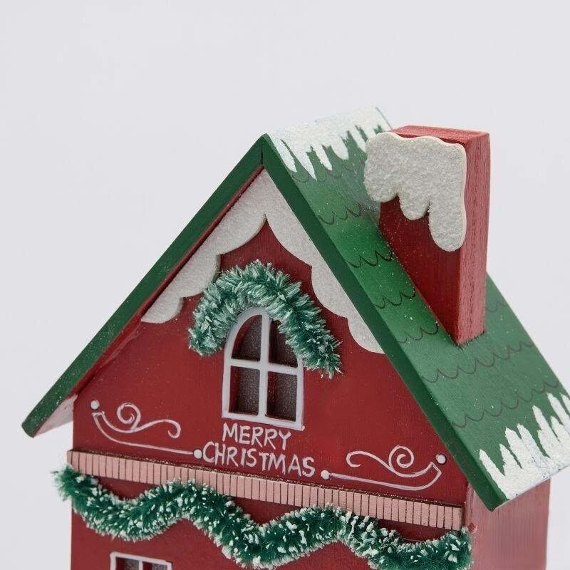 Casetta di Natale innevata in legno rosso con ghirlande, Babbo Natale, alberi e luce led, perfetta come decorazione di Natale