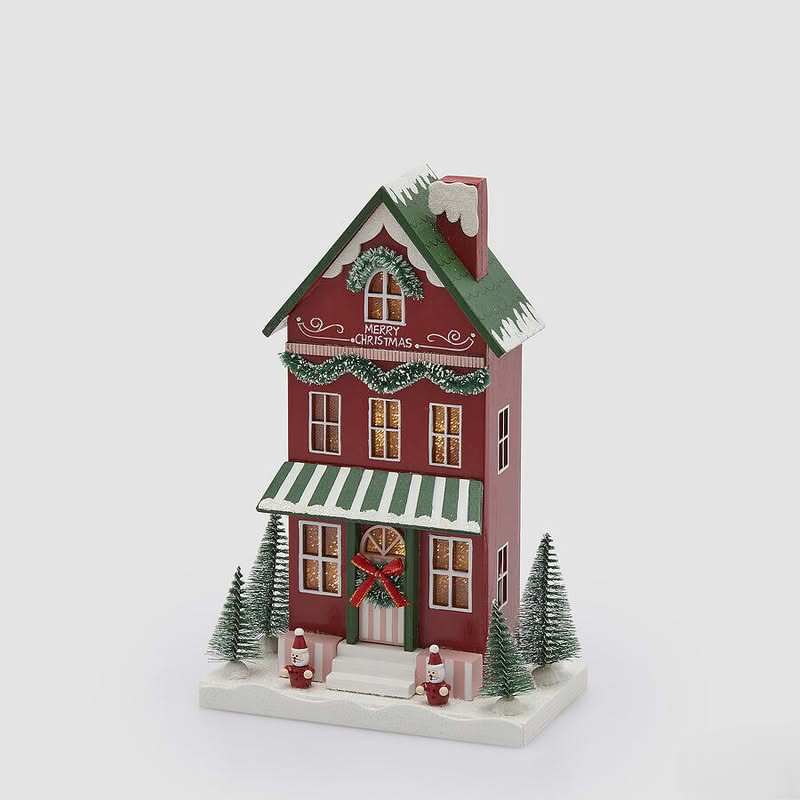 Casetta di Natale innevata in legno rosso con ghirlande, Babbo Natale, alberi e luce led, perfetta come decorazione di Natale