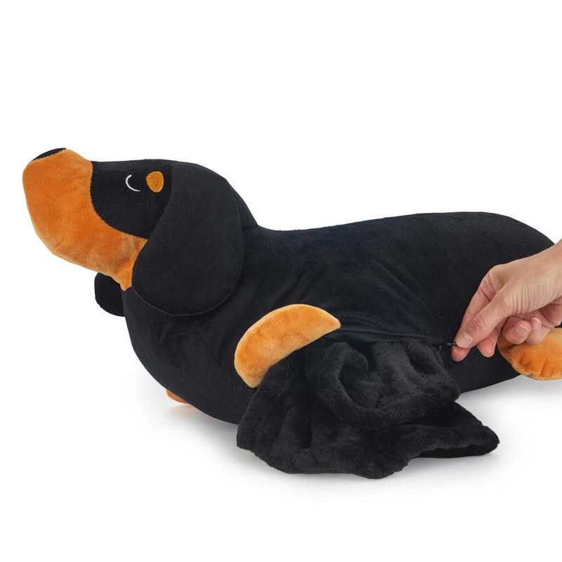 Cuscino a forma di bassotto nero e marrone con al suo interno una coperta dello stesso colore di dimensione 150 x 110 cm, il tutto è lavabile in lavatrice
