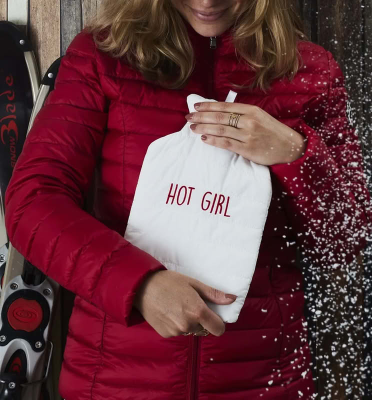 Boule acqua calda a forma di cappotto bianco con cerniera e scritta “Hot girl