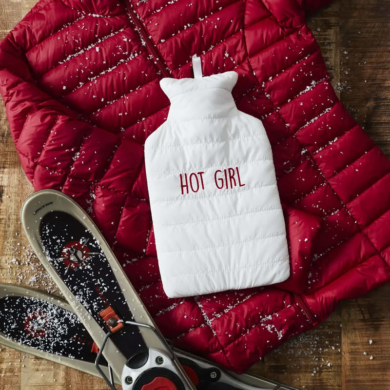 Boule acqua calda a forma di cappotto bianco con cerniera e scritta “Hot girl