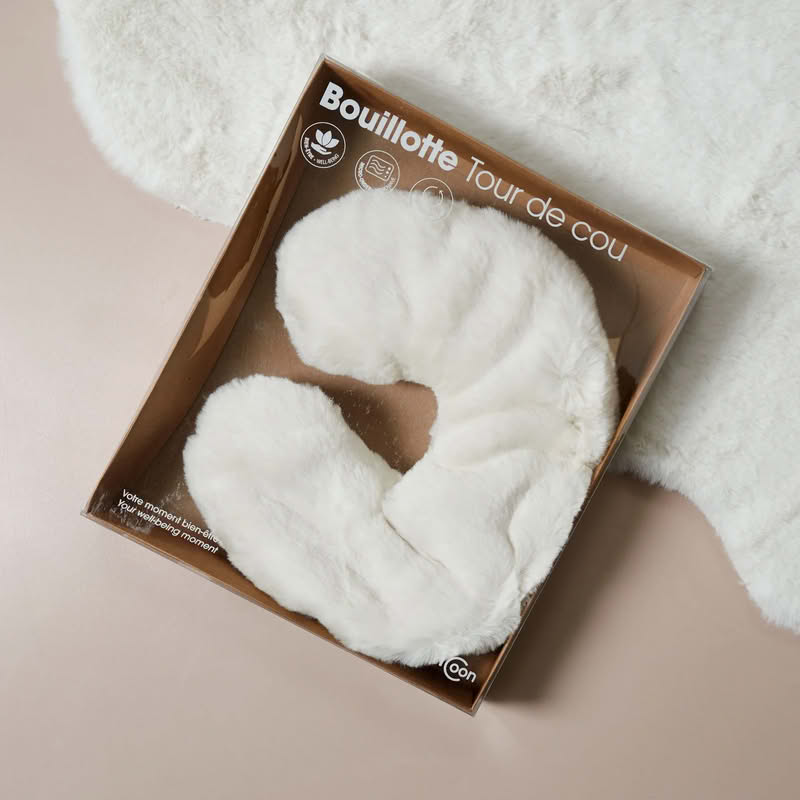 Boule calda girocollo con pelo bianco e interno con sfere di argilla che mantengono il calore