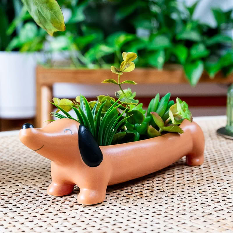 Fioriera a forma di bassotto marrone in ceramica